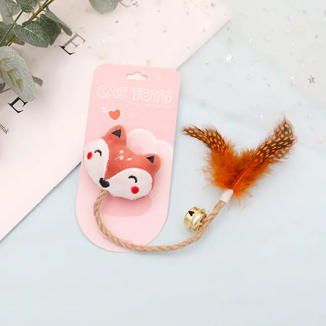 Juguete para gato con pluma, cascabel y muñeco😻