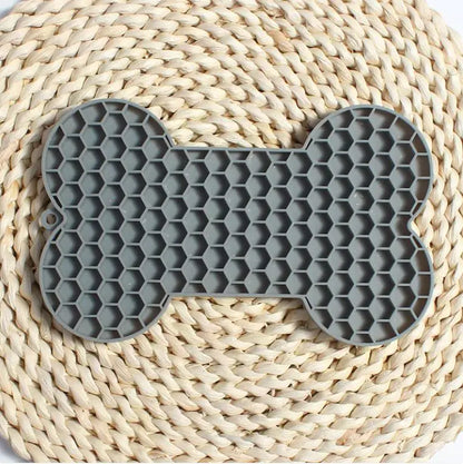 🐶🐾Alfombrilla de Silicona en Forma de Hueso para Perros — Lento Alimentación y Lamer