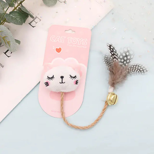 Juguete para gato con pluma, cascabel y muñeco😻