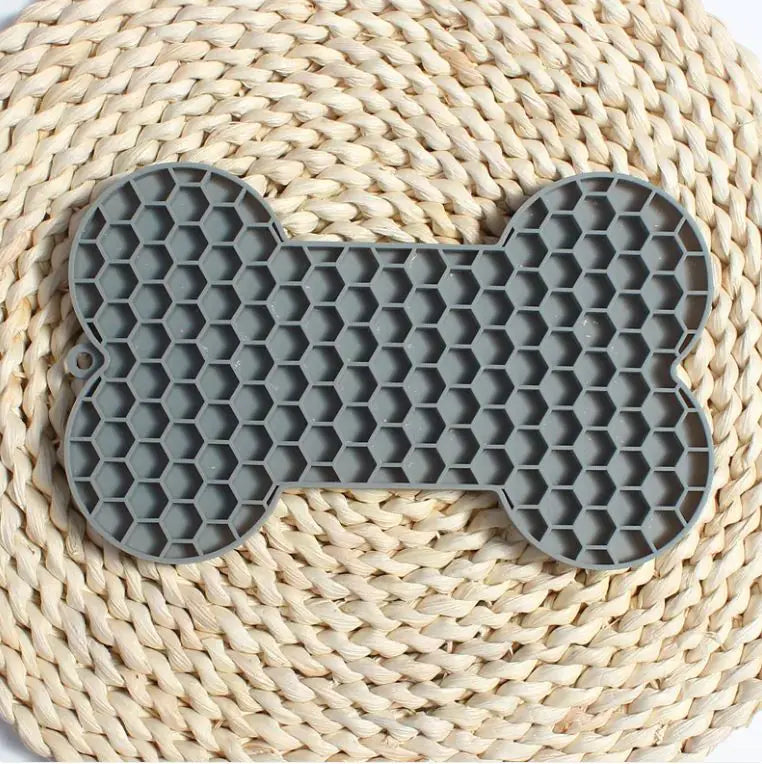 🐶🐾Alfombrilla de Silicona en Forma de Hueso para Perros — Lento Alimentación y Lamer