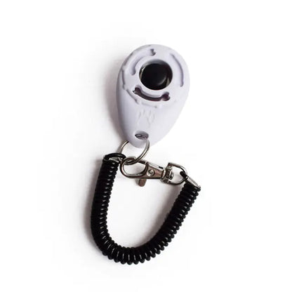 Clicker ajustable para adiestramiento de perros con correa tipo llavero.